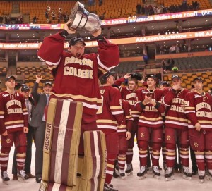 San Diego's Thatcher Demko holds aloft his second Beanpot in three years.